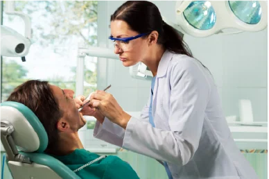 Application of fluoride gel or varnish during the treatment at Amazing Family Dental, providing concentrated fluoride directly to the teeth.