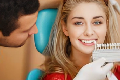 Placing a temporary crown on the patient at Amazing Family Dental, providing protection while the permanent crown is being made.