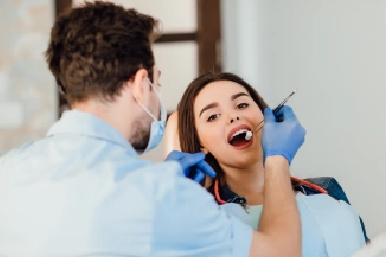 Fitting the first set of clear aligners at Amazing Family Dental, ensuring a comfortable fit and explaining how to wear and care for them.