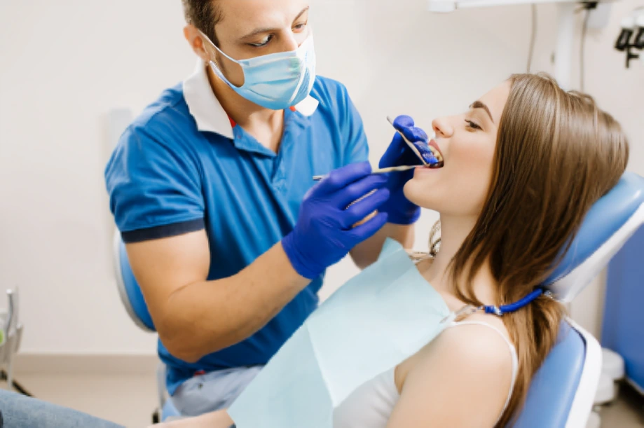 Attaching the abutment to the dental implant at Amazing Family Dental, which serves as a connector for the final crown.