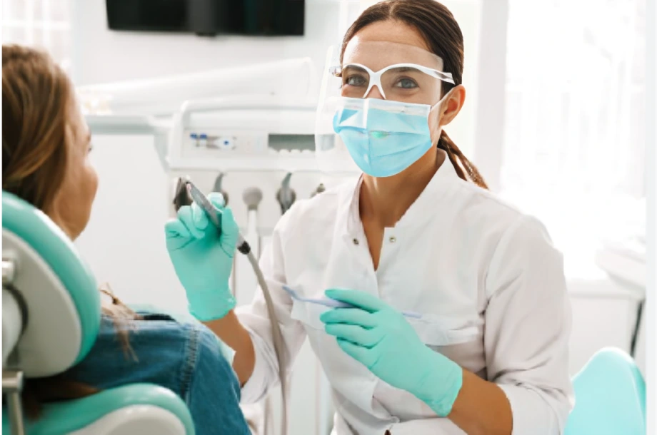 Placing the final crown on the dental implant at Amazing Family Dental, completing the restoration and enhancing the patient's smile.