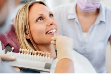 Taking impressions of the patient’s teeth at Amazing Family Dental to craft custom-made dental veneers that fit perfectly.